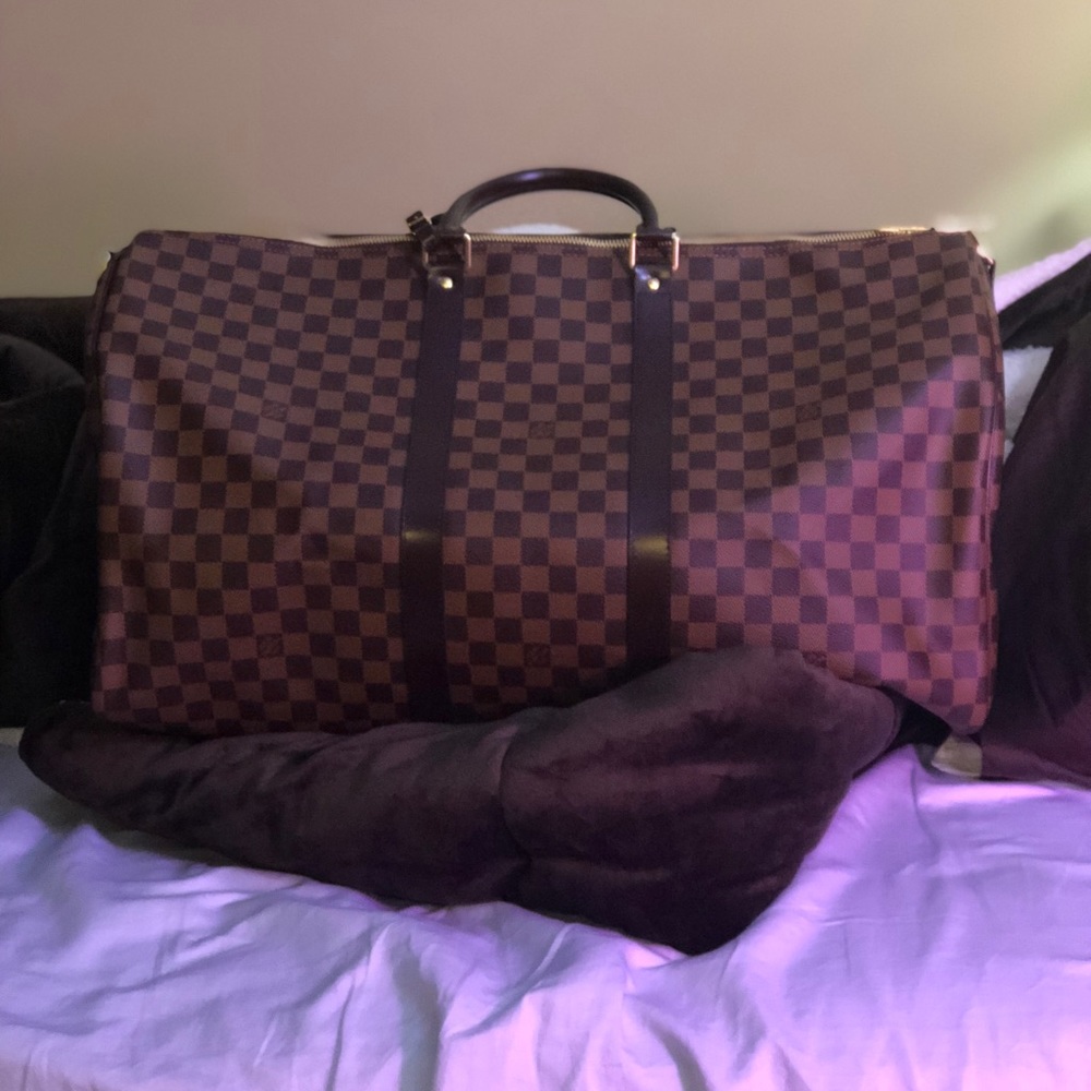 LV duffle Bag. Only used twice.